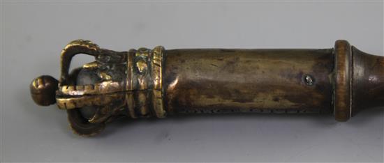 An early 19th century brass tipstaff, 7.5in.